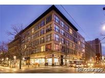 Attractive exterior view of the building at dusk with street view and pedestrian activity at 720 16Th St # 513, Denver, CO 80202