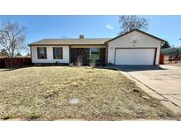Charming single-Gathering home featuring a 2-car garage, well-kept exterior, and mature landscaping at 2708 W 98Th Dr, Denver, CO 80260