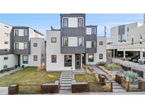 Modern multi-story home featuring geometric design, neutral color palette, and low-maintenance landscaping at 1930 W 35Th Ave, Denver, CO 80211