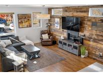 Inviting living room with stylish decor and plenty of natural light at 1930 W 35Th Ave, Denver, CO 80211