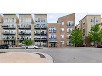 The Lofts building exterior, featuring modern architecture and landscaping at 7240 W Custer Ave # 205, Lakewood, CO 80226