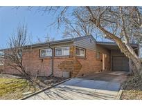 Brick ranch home with gray accents and wood siding at 345 S Forest St, Denver, CO 80246