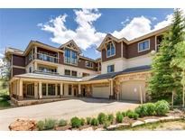 Beautiful multi-level home with covered parking and landscaped front yard, perfect for mountain living at 655 Four Oclock Rd # 204, Breckenridge, CO 80424