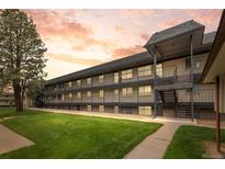 Inviting multi-Gathering home boasting brick facade, landscaped grounds, and outdoor living space at 1723 Robb St # 43, Lakewood, CO 80215