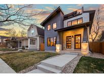Modern two-story home featuring unique architectural design and a well-maintained front yard at 3925 Winona Ct, Denver, CO 80212