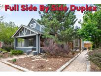 Charming duplex with meticulous landscaping, showcasing a blend of modern gray paint, stone pathway, and lush green trees at 1518-1520 S Sherman St, Denver, CO 80210