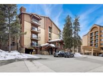 Inviting exterior showcases balconies and covered parking for mountain living at 720 Columbine Rd # B, Breckenridge, CO 80424