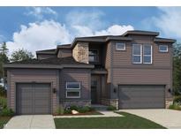 New construction home featuring horizontal siding, stone accents, and a two-car garage at 898 Coal Bank Trl, Castle Rock, CO 80104