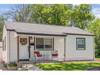 Charming exterior view of home featuring a cozy porch with decorative accents at 3218 S Lafayette St, Englewood, CO 80113