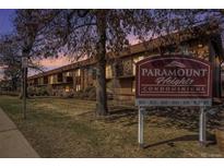 Paramount Heights Condominiums sign and building exterior at sunset at 10115 W 25Th Ave # 1, Lakewood, CO 80215