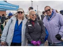 This is a picture of happy volunteers at a community service event at 10115 W 25Th Ave # 1, Lakewood, CO 80215