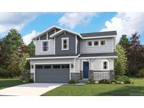 Charming two-story home with a gray garage door, blue front door, a welcoming porch, and professional landscaping at 8295 Snake River St, Littleton, CO 80125