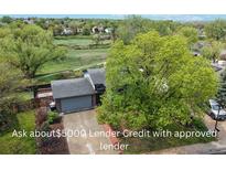 Charming home featuring an attached garage and mature trees and close proximity to open space and trails at 10759 Clermont St, Thornton, CO 80233