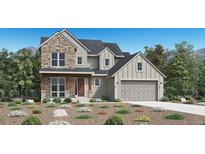Charming two-story home with stone accents, a covered porch, an attached two-car garage, and professionally landscaped yard at 5868 Santa Cruz Pt, Parker, CO 80134
