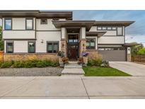 Charming home featuring a stone facade, well-manicured landscaping, and a welcoming entrance at 5420 Baseline Rd, Boulder, CO 80303