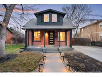 Charming brick home with updated facade and landscaping at 4030 Lowell Blvd, Denver, CO 80211