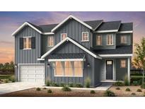 Charming two-story home featuring board and batten siding, a two-car garage and welcoming front porch at 3327 Backdrop Ct, Castle Rock, CO 80108