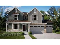 Charming two-story home showcasing a blend of modern design and inviting curb appeal, complemented by manicured landscaping at 4629 Hatcher Dr, Brighton, CO 80601