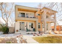 Beautiful two-story home featuring modern design, lovely landscaping, and a welcoming front porch at 4330 N Raleigh St, Denver, CO 80212