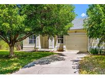 Charming single-Gathering home with mature trees and a well-manicured lawn at 3962 Hoyt Ct, Wheat Ridge, CO 80033