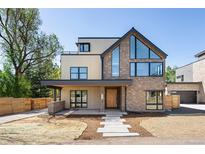 Stunning two-story home featuring stone accents, expansive windows, and a welcoming modern design at 2190 Vine Ave, Boulder, CO 80304