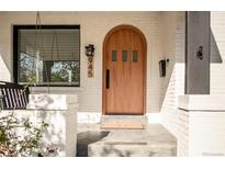 Inviting front door with modern design and visible house number at 945 Jackson St, Denver, CO 80206