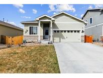 Charming single-Gathering home with a well-maintained lawn and a two-car garage in a suburban neighborhood at 9533 Cherry Ln, Thornton, CO 80229