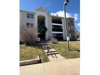 Multi-story apartment building with dark balconies and stone accents, showcasing a well-maintained exterior at 12304 W Cross Dr # 304, Littleton, CO 80127