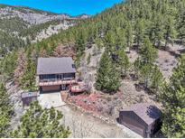 Mountain home with large deck and gorgeous views at 617 Hummingbird Trl, Idaho Springs, CO 80452