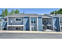 Charming two-story townhome featuring a private balcony and inviting outdoor spaces at 7185 S Gaylord St # A, Littleton, CO 80122