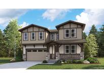 Two-story Craftsman style home with a large front yard and attached two-car garage at 8205 Cokedale Cir, Littleton, CO 80125