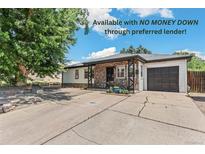 Charming single-story home with stone accents and a well-manicured front yard in a quiet neighborhood at 1680 S Patton Ct, Denver, CO 80219