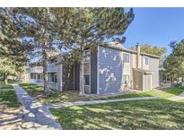 Charming condo featuring stone accents and a welcoming balcony at 18193 E Kentucky Ave # 204, Aurora, CO 80017