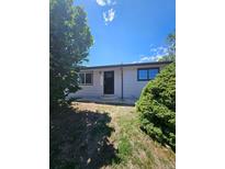 Charming single-story home featuring new windows and a well-maintained front yard at 2767 W Iliff Ave # 1, Denver, CO 80219