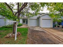 Charming single-Gathering home featuring a two-car garage, beautiful landscaping, and mature trees in a quiet neighborhood at 11149 Gaylord St, Northglenn, CO 80233
