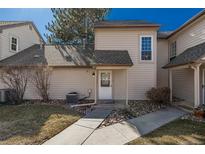 Inviting home with a charming front entrance and well-maintained landscaping at 2101 S Victor St # C, Aurora, CO 80014