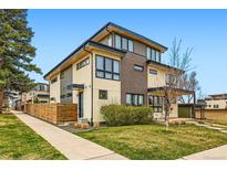 Stunning modern home with mixed siding, well-kept lawn, and inviting curb appeal at 3188 W 28Th Ave, Denver, CO 80211