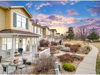 Charming townhomes featuring inviting patios and landscaped walkways in a well-maintained community at 3820 Colorado Ave # E, Boulder, CO 80303