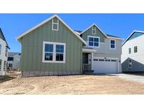 Charming two-story home with a two-car garage and a modern color scheme at 39887 Floyd St, Elizabeth, CO 80107