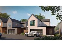 Modern two-story home featuring a garage, minimalist design, and a well-manicured lawn at 625 Lombardi Cir, Louisville, CO 80027