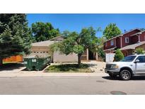 Charming single-Gathering home with a well-maintained front yard and a cozy porch at 756 Brookside Dr, Longmont, CO 80504