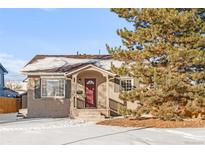 Charming ranch home with a recently updated exterior and landscaping at 185 S Eliot St, Denver, CO 80219