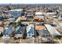 Charming neighborhood view with historic homes and modern apartments, showcasing the property's location at 3643 Shoshone St, Denver, CO 80211