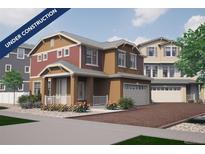 Inviting two-story home with a two-car garage and charming front porch under construction at 1181 Highview Dr, Erie, CO 80516