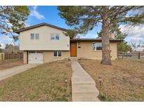 Charming split-level home with brick and siding, mature tree, and attached single-car garage at 80 S 38Th St, Boulder, CO 80305