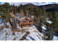 Mountain home with deck and stunning views! at 4969 S Indian Trl, Evergreen, CO 80439