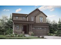 Charming two-story home with a covered front porch and attached two-car garage at 7367 S Yank Ct, Littleton, CO 80127