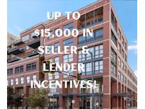 Modern brick condo building with balconies and large windows, near Palace Lofts at 1499 Blake St # 3U, Denver, CO 80202