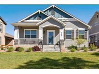 Charming home featuring attractive architectural details and a well-maintained front yard at 763 Sage Forest Ln, Monument, CO 80132