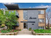 Lee Plaza apartment building with well-maintained landscaping and balconies at 200 N Sherman St # 7, Denver, CO 80203